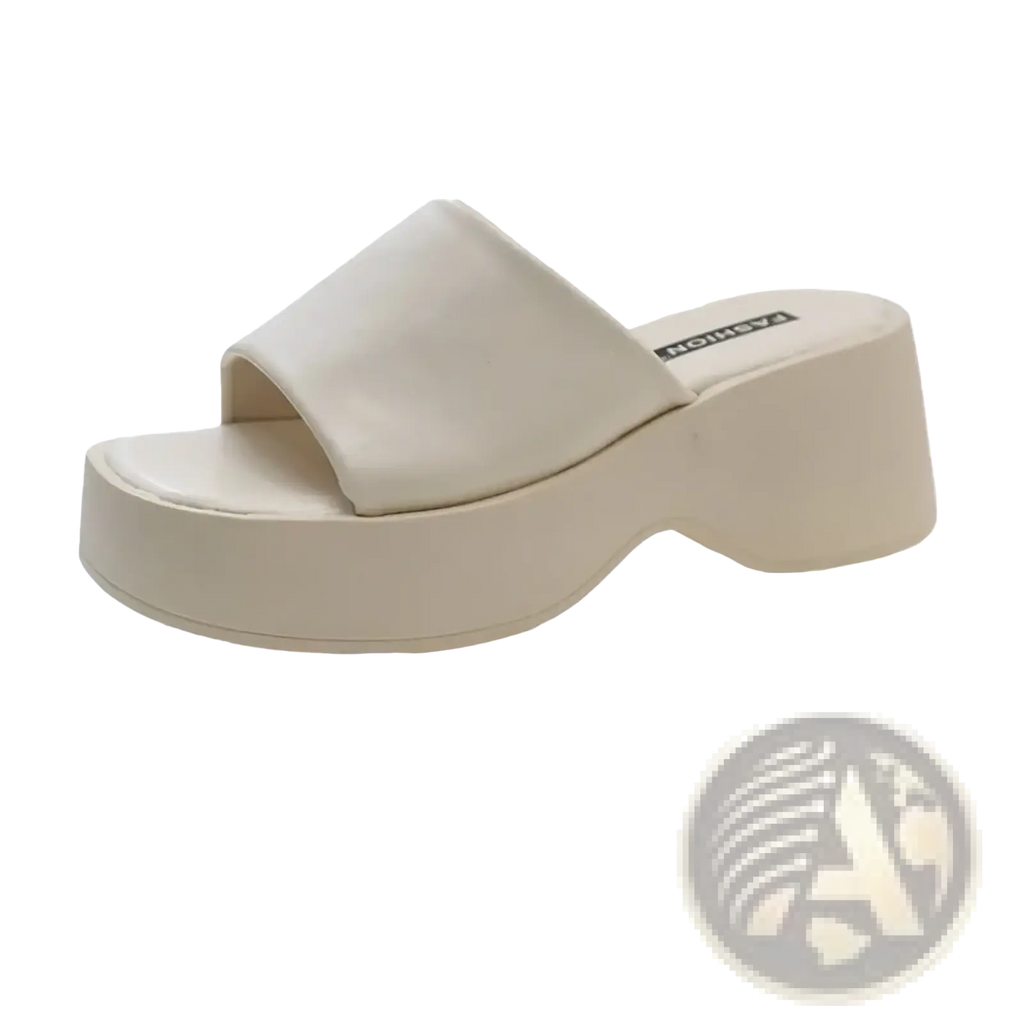 Cream-colored platform slide sandal with a thick block heel and smooth matte finish for summer wear
