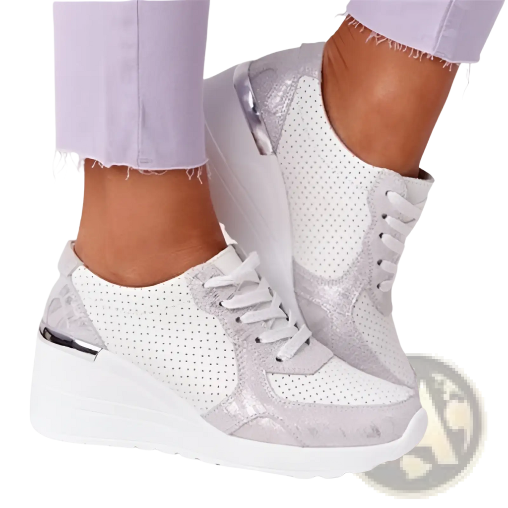 White and silver perforated platform sneakers with chunky wedge sole and mesh lace up casual design