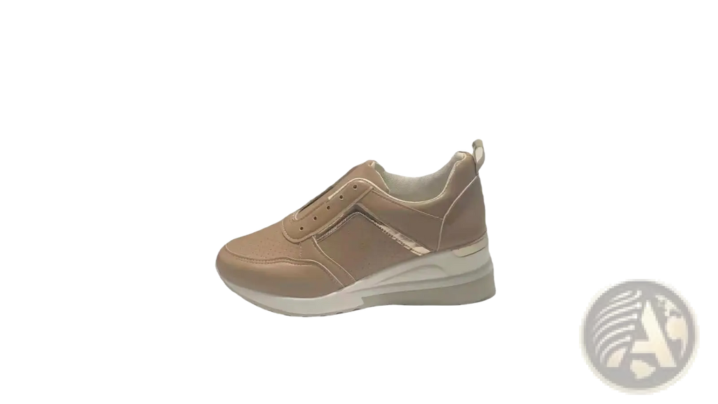 Beige suede platform sneakers with chunky white sole and subtle metallic accent panel for casual wear
