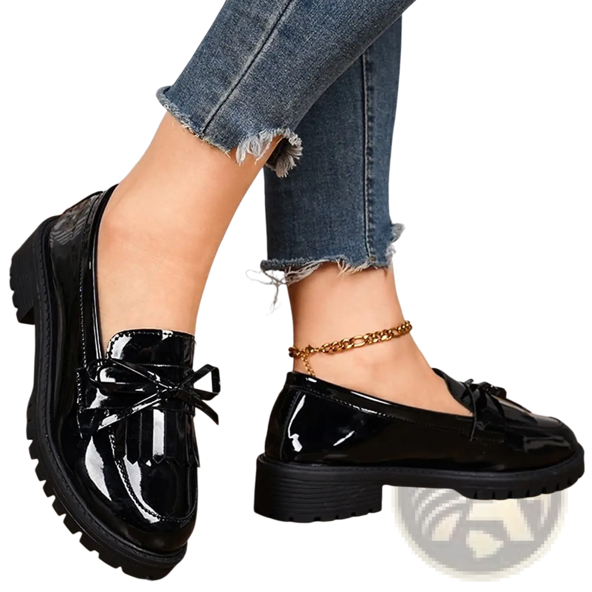 Black patent leather platform tassel loafers for women with glossy finish and decorative bow detail for casual wear