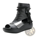 Black leather platform wedge sandals with peep toe and decorative knot and tassel on ankle strap