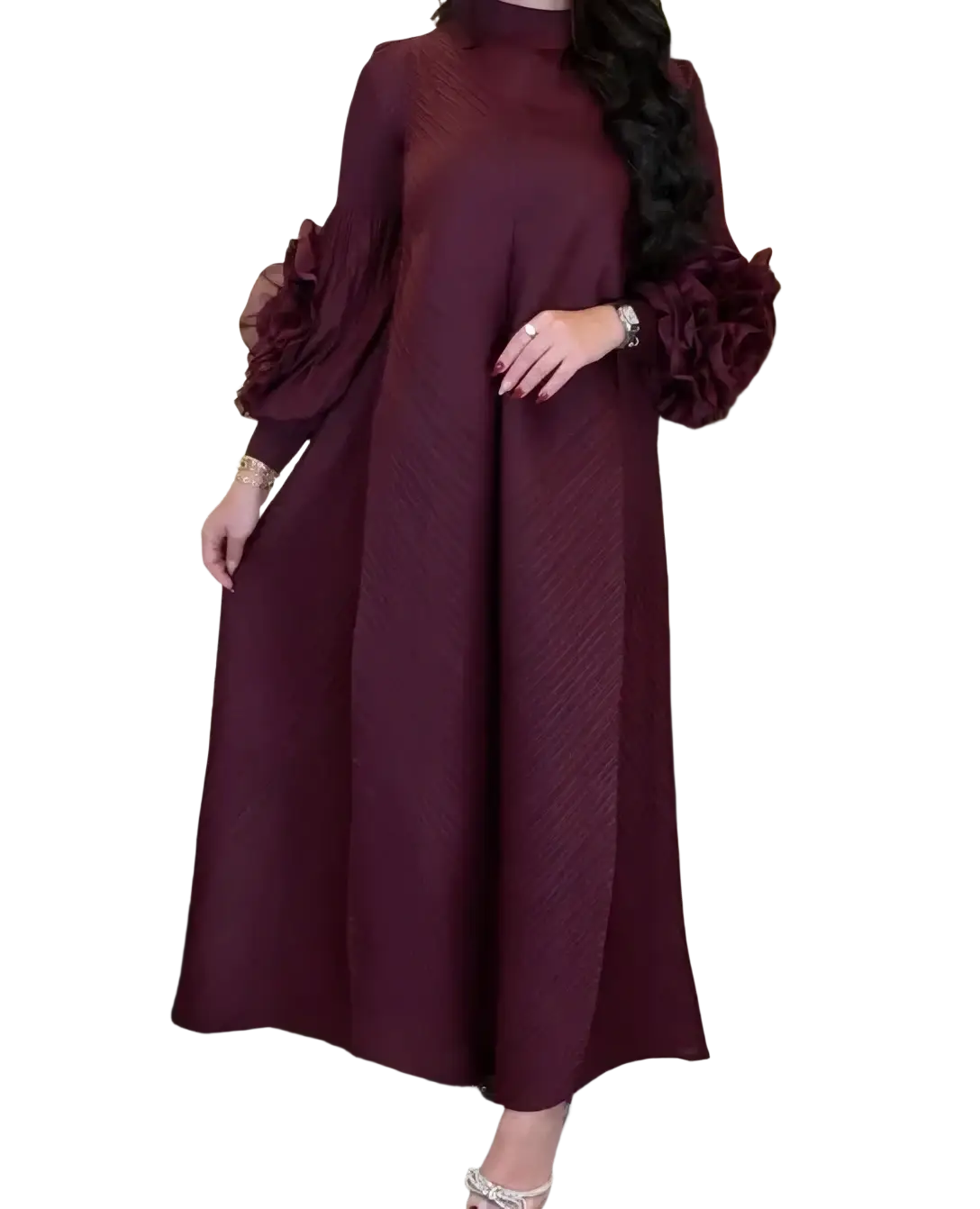A flowing maroon pleated evening dress with high neckline and voluminous sleeves adorned with fabric roses