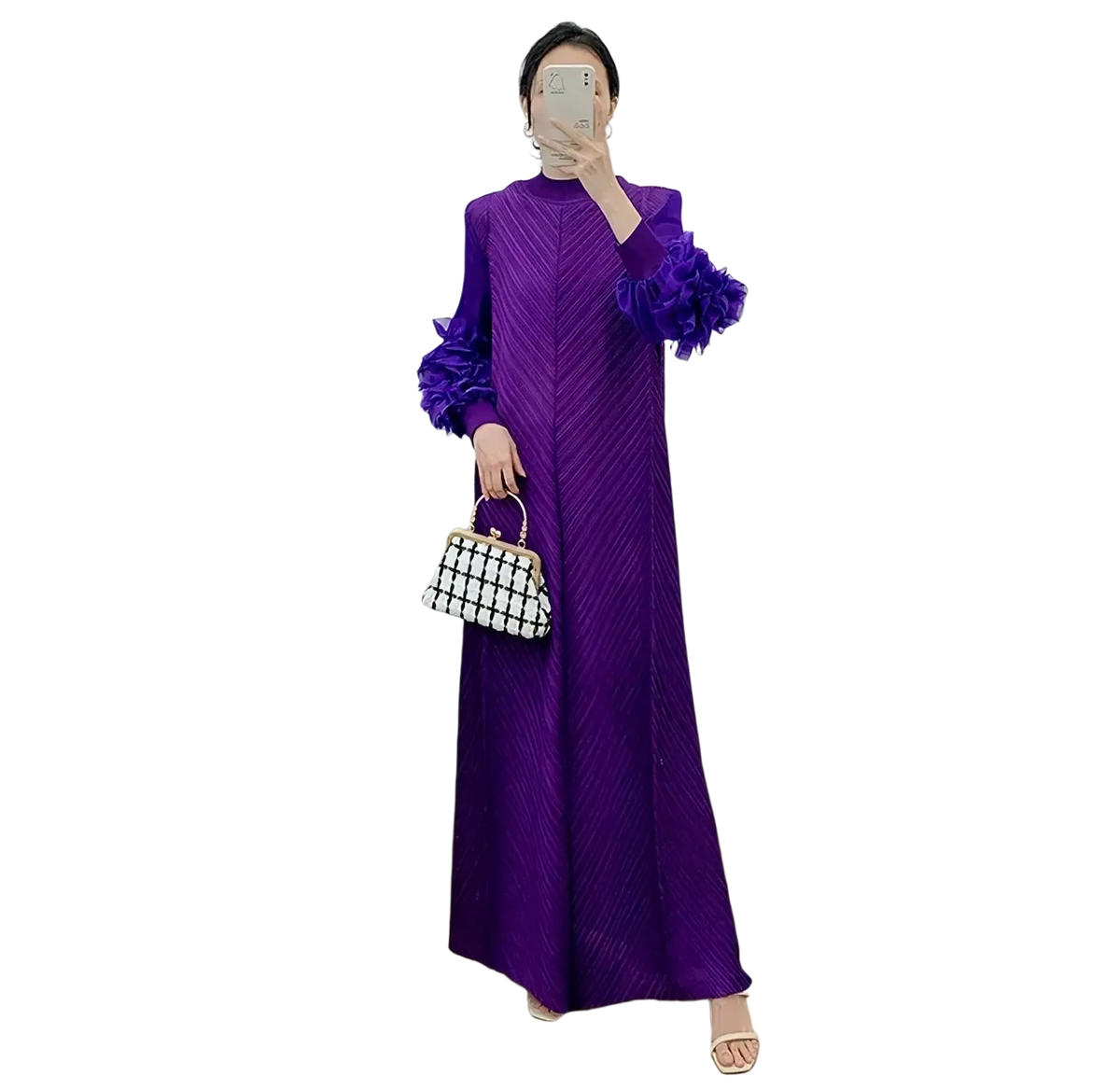 A vibrant purple pleated evening dress with long sleeves and ruffled cuffs made of textured fabric