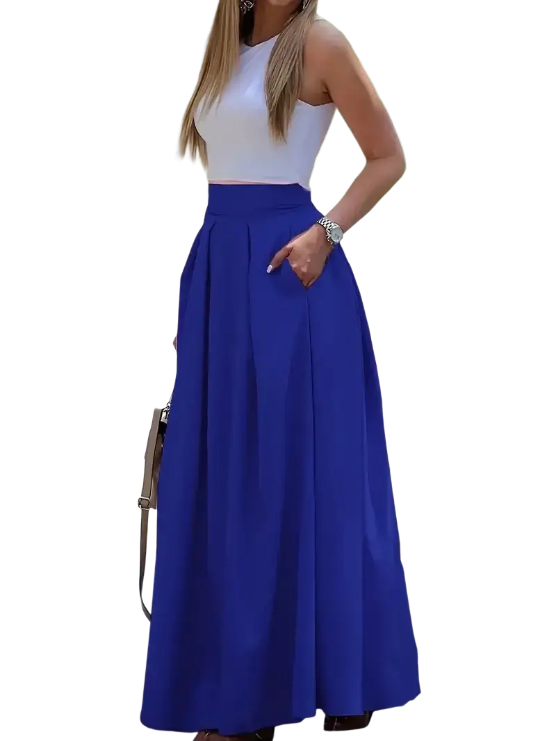 A flowing royal blue pleated high waist maxi skirt made of lightweight fabric for elegant casual wear