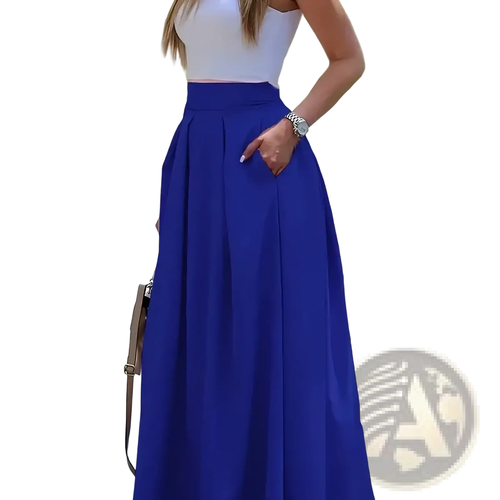 Pleated high waist maxi skirt in royal blue featuring a flowing pleated design suitable for elegant occasions