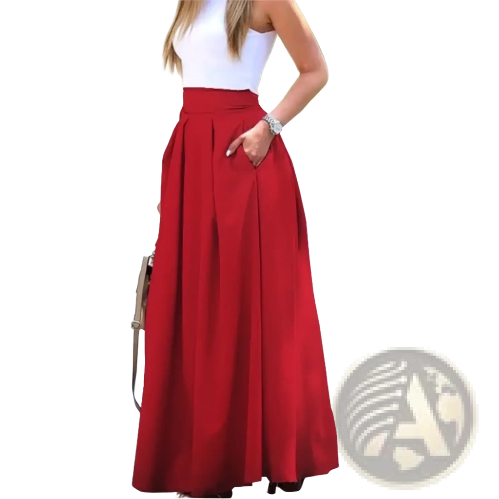 A vibrant red pleated high waist maxi skirt in lightweight fabric with side pockets for versatile wear