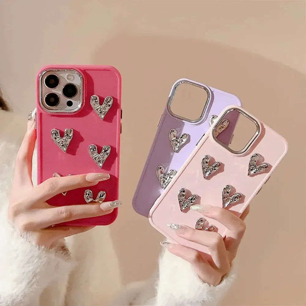 Pink pleated metallic heart charm phone case back side adorned with silver heart-shaped embellishments