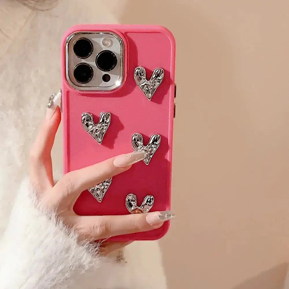 Pink pleated metallic heart charm phone case back side with silver ornate heart shaped embellishments
