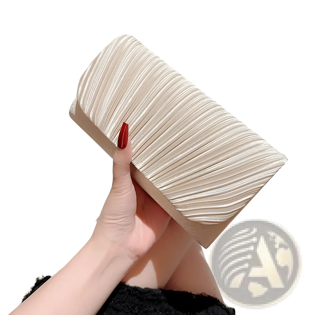 A sleek off-white pleated satin clutch with minimalist design for women’s evening use