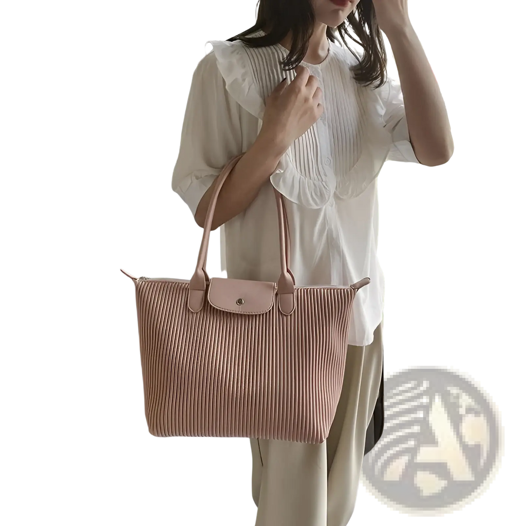 A soft pink pleated shoulder bag minimalist pu leather tote with leather handles and elegant design
