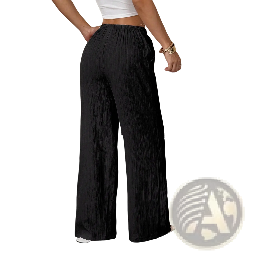 Black pleated wide leg casual pants with elastic waistband designed for comfortable everyday wear