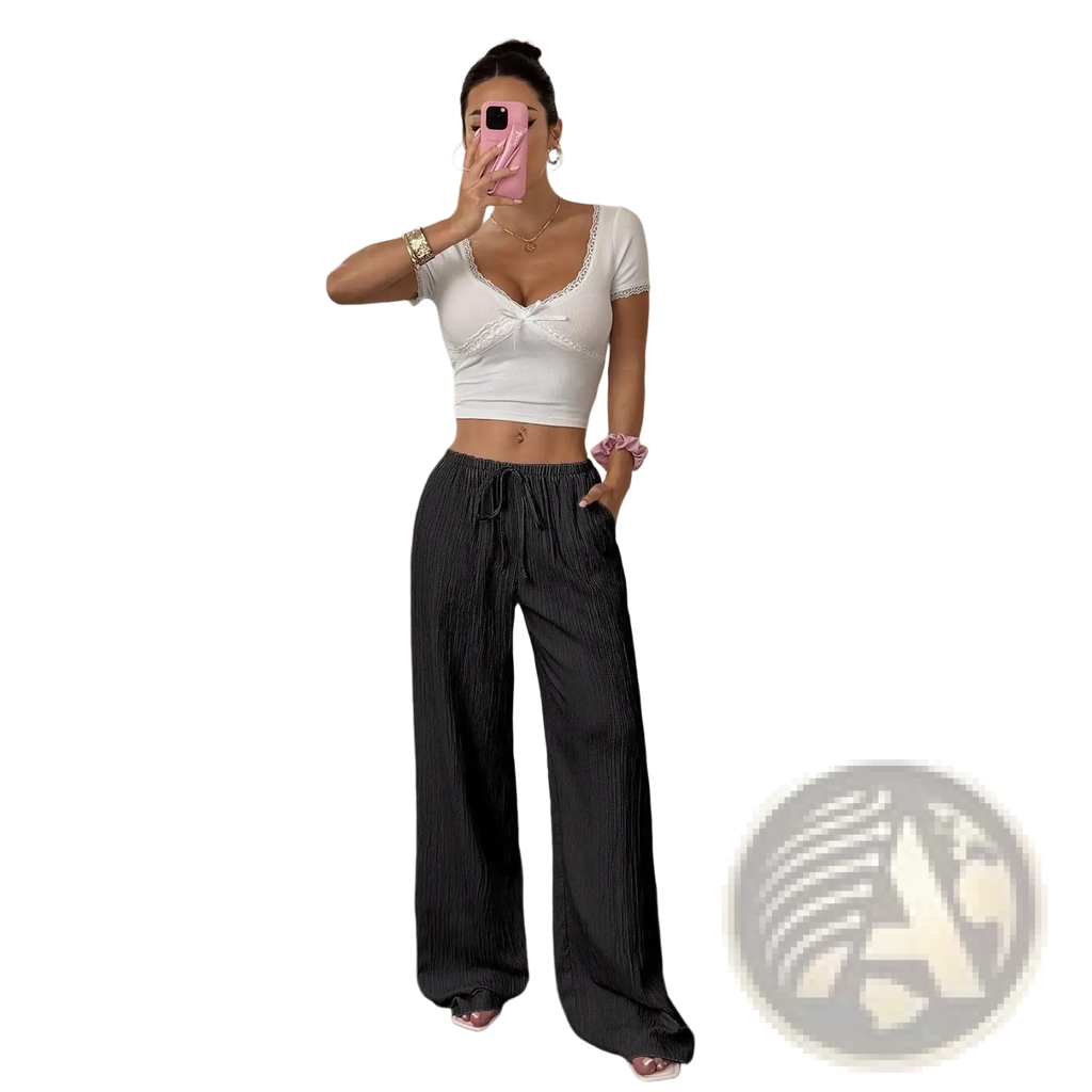 Black pleated wide leg casual pants with drawstring waistband designed for comfortable everyday wear
