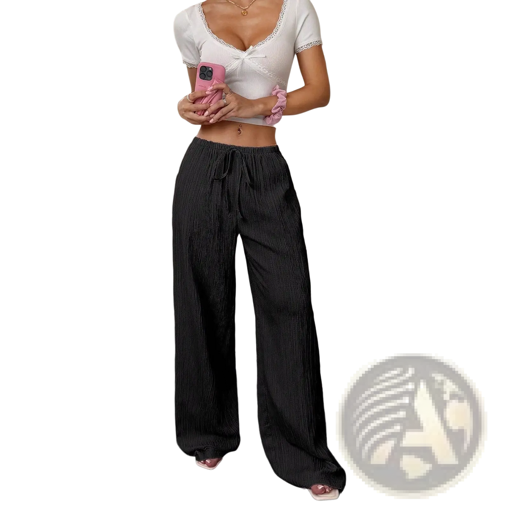 Black pleated wide leg casual pants with drawstring waistband designed for comfortable everyday wear