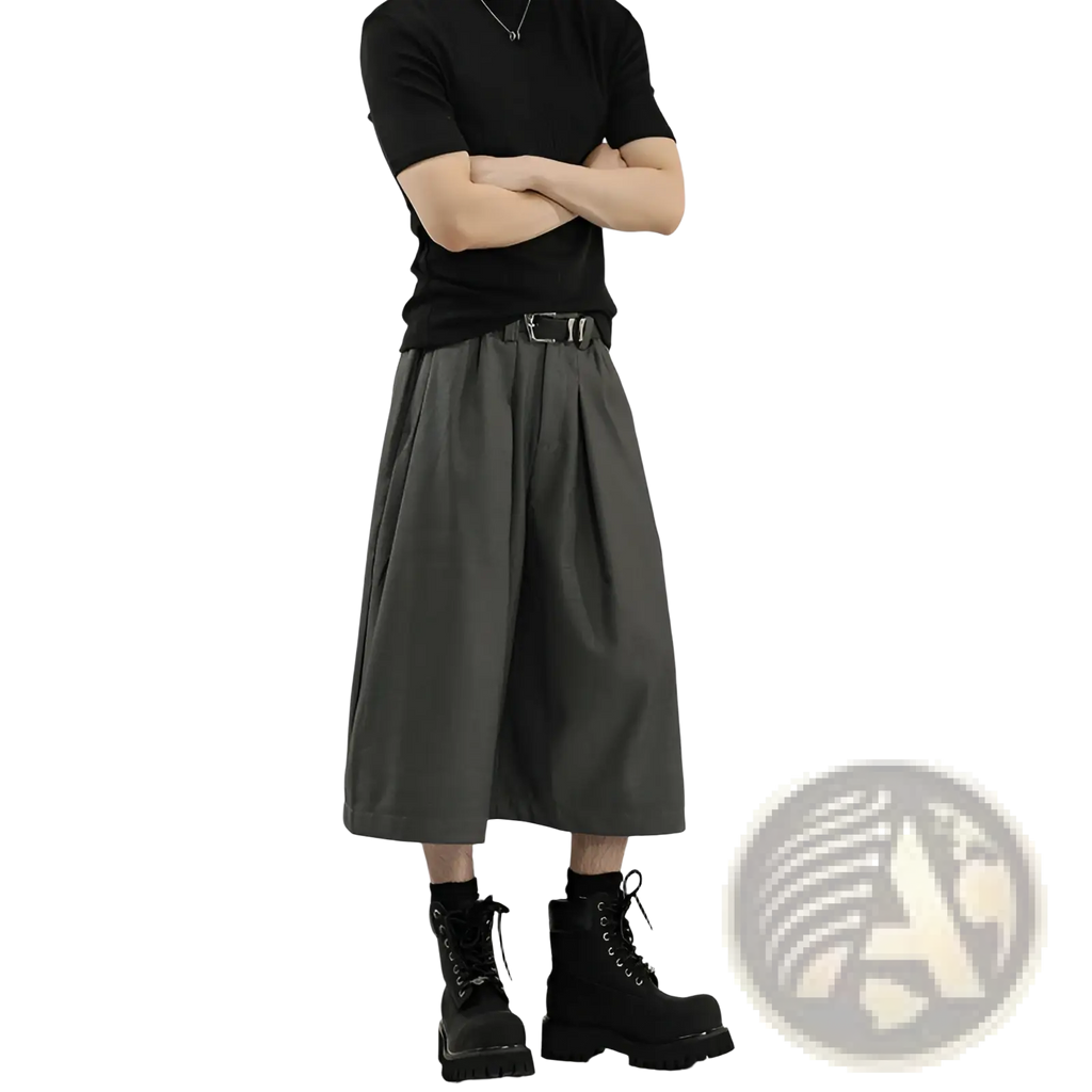 Dark gray pleated wide leg mens suit shorts with a high waist and relaxed fit in a soft fabric