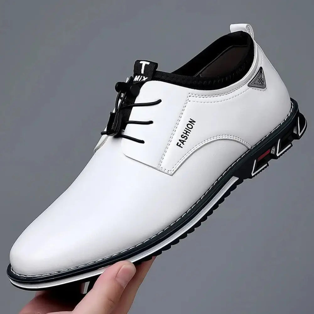 Men’s plus size white leather lace-up casual shoe with black laces, geometric patterned black sole, and fashion stitching