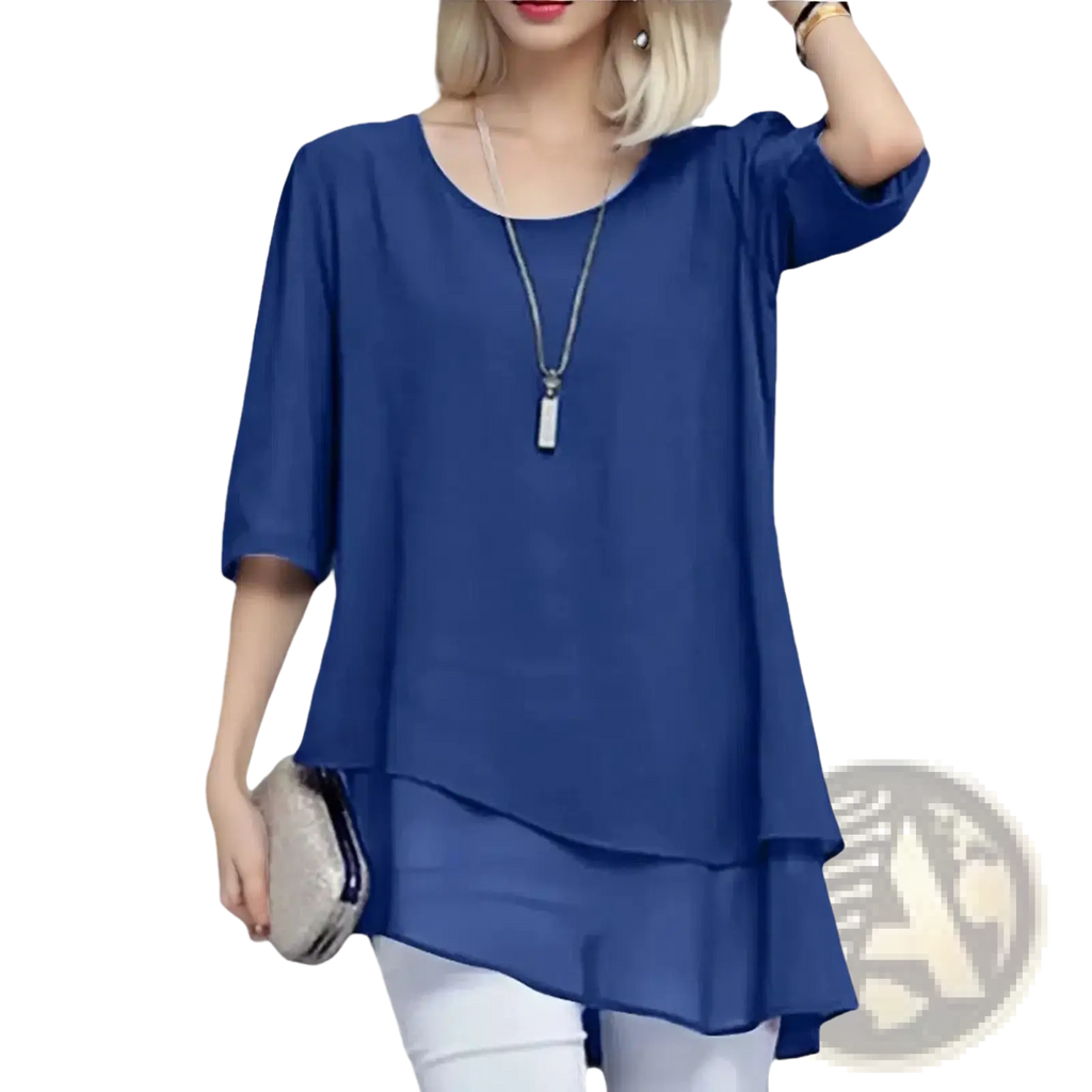 Plus size chiffon layered top in royal blue with flowing fabric three-quarter sleeves and relaxed asymmetrical hemline