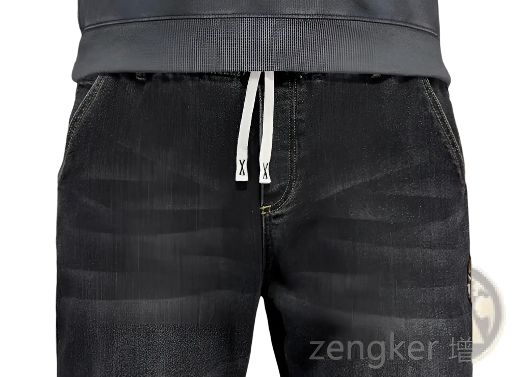 Plus size dark-wash denim joggers with elastic waist loose straight fit and white drawstring ties with black x branding
