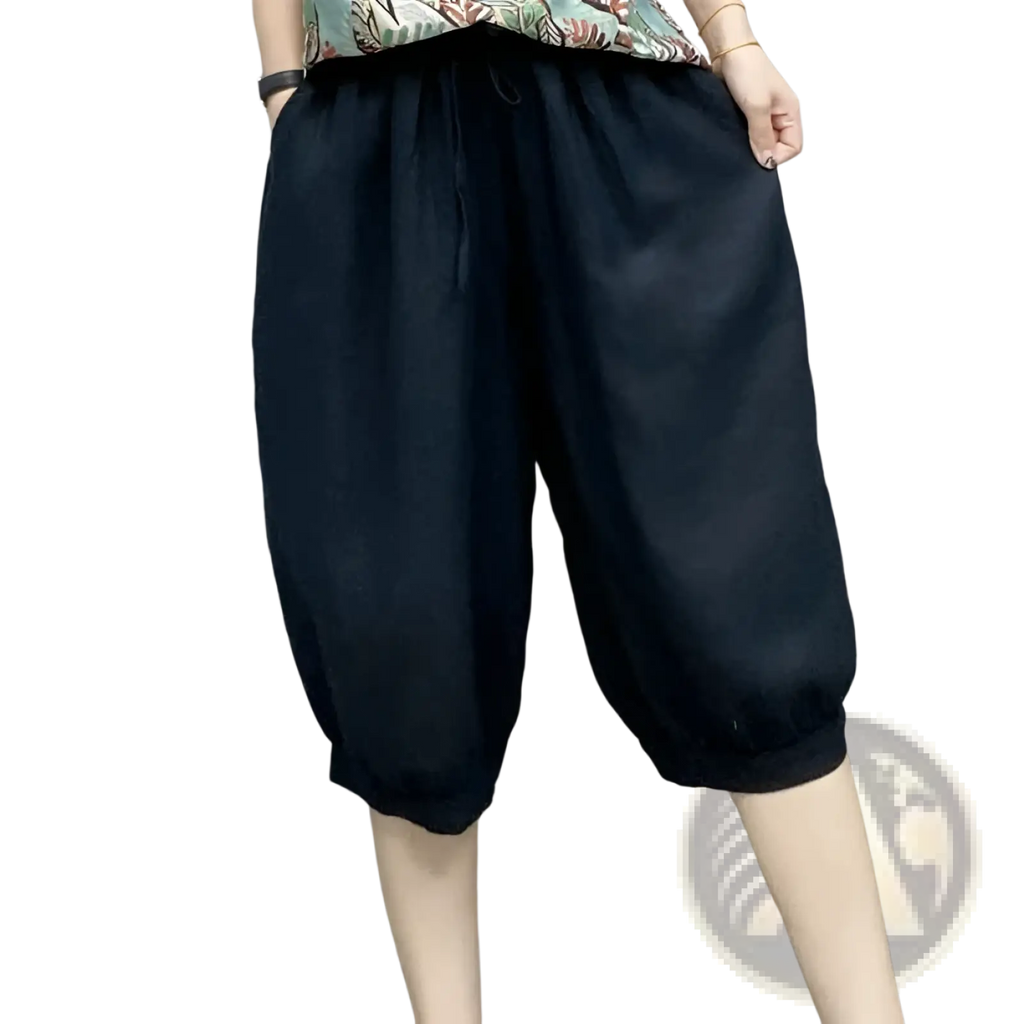 Plus size black linen harem capri pants with drawstring waist and elastic cuffs for a comfortable fit