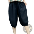 Plus size black linen harem capri pants with drawstring waist and elastic cuffs for a comfortable fit