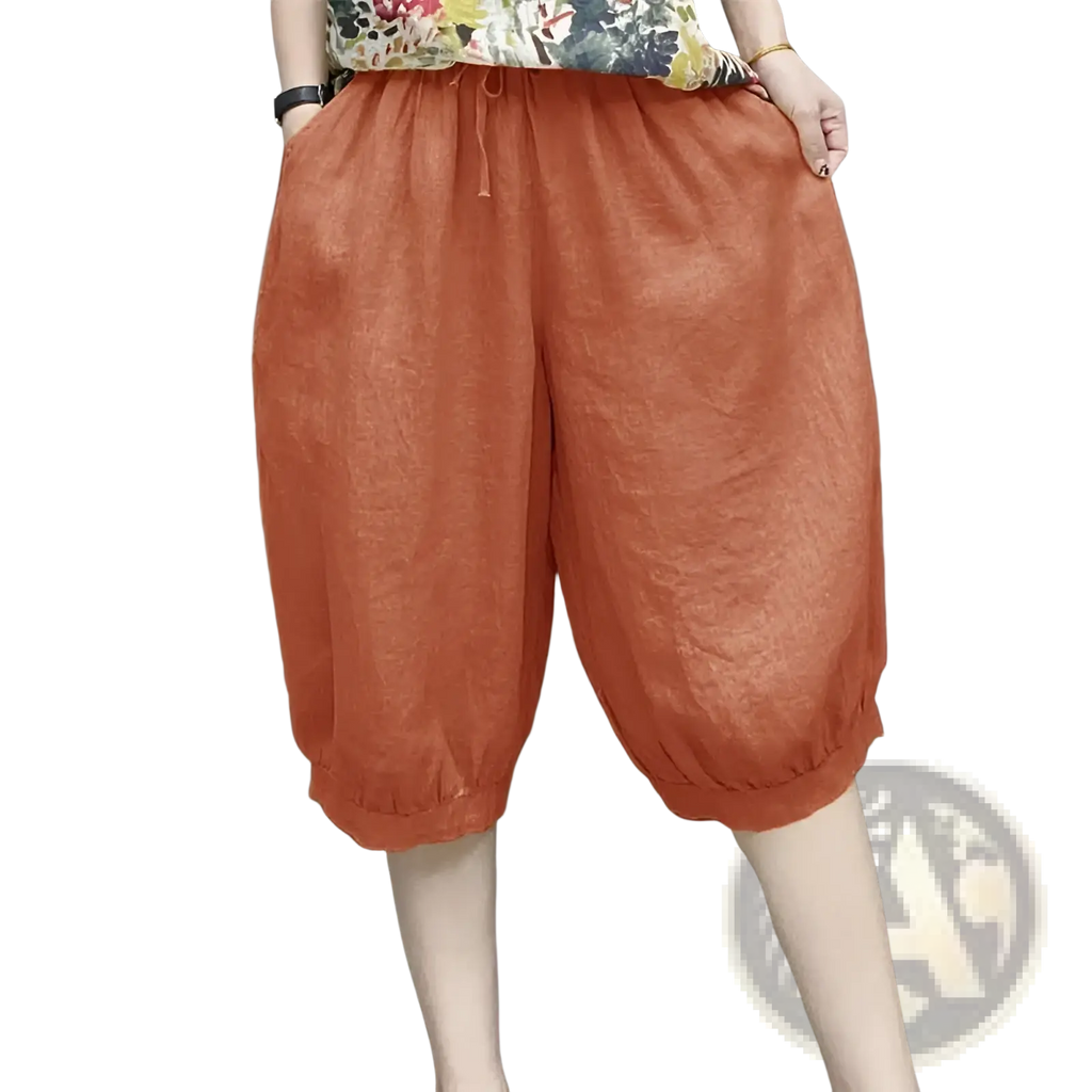 Plus size linen harem capri pants in cotton-orange with drawstring waist and elastic cuffs for a loose fit