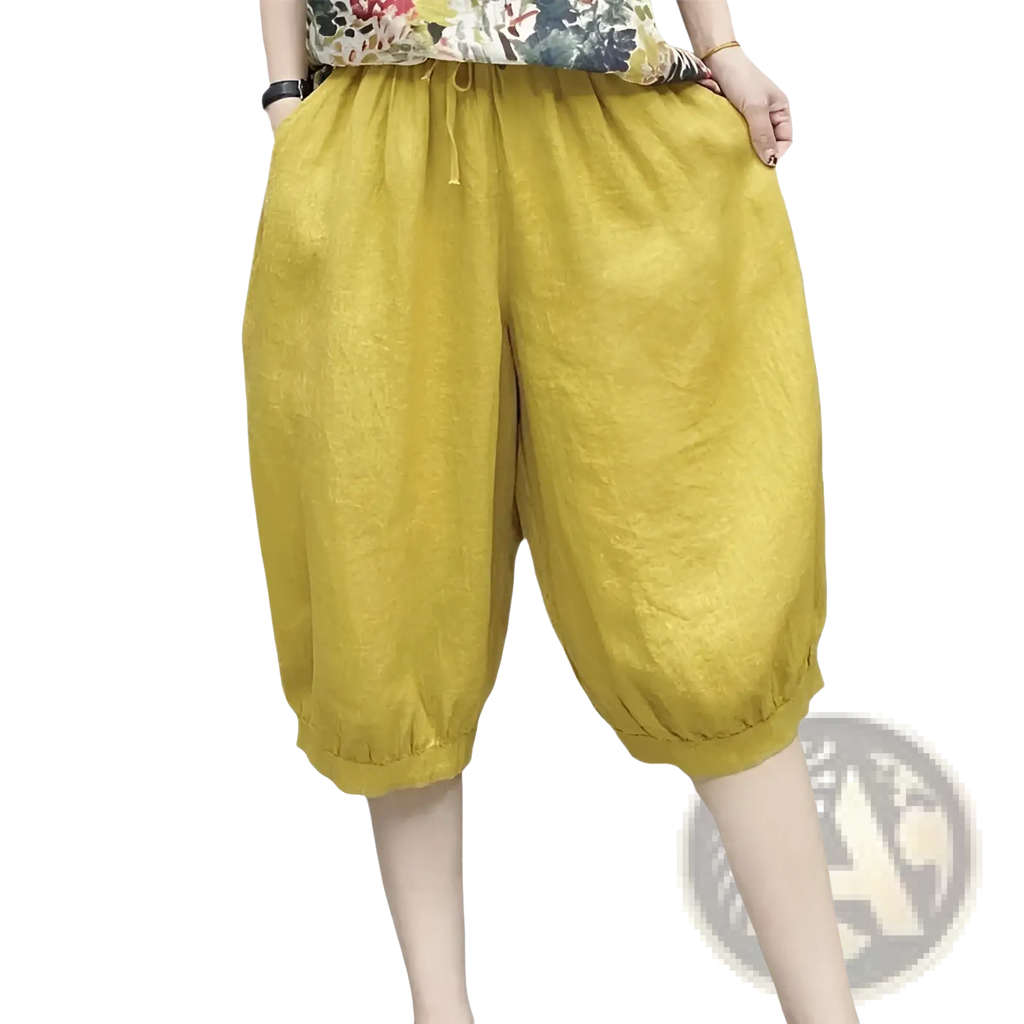 Plus size yellow linen harem capri pants with drawstring waist and elastic cuffs for comfortable casual wear