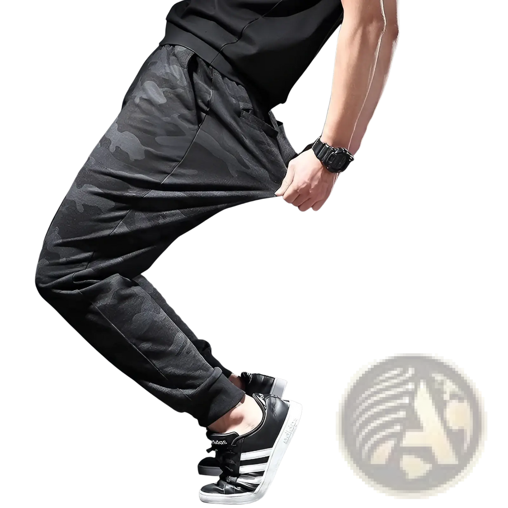 Plus size mens athletic jogger pants in black camouflage pattern with relaxed fit and elastic cuffs
