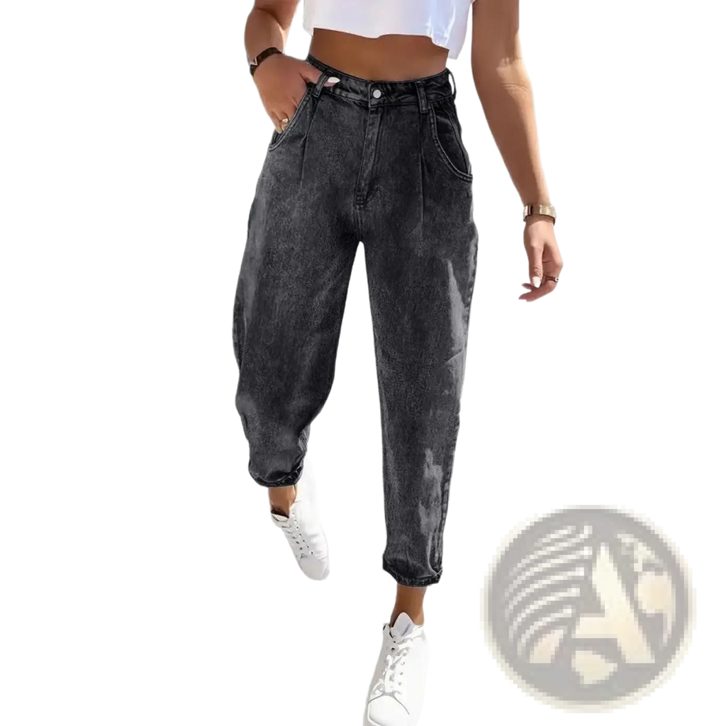 Plus size retro washed tapered denim jeans featuring high-waisted black denim with faded distressed finish and cuffed hems