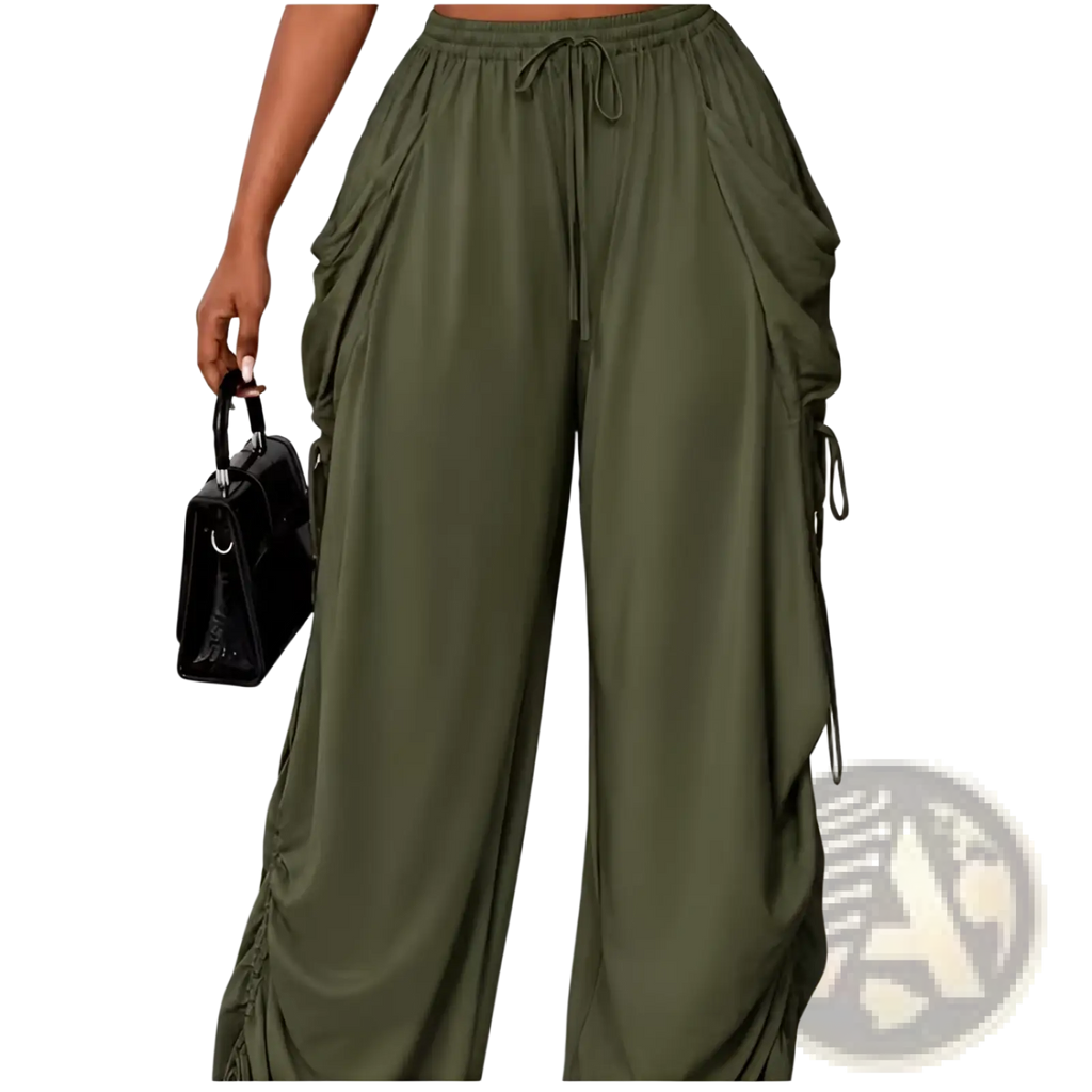 Plus size ruched athletic pants in olive green with drawstring waist and side pockets for comfortable wear