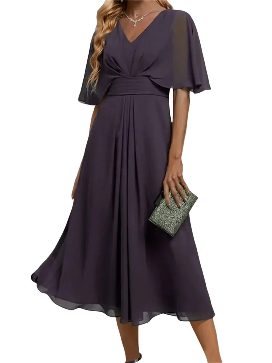 Plus size v-neck chiffon evening party dress in deep purple with flowing midi length and sheer cape sleeves