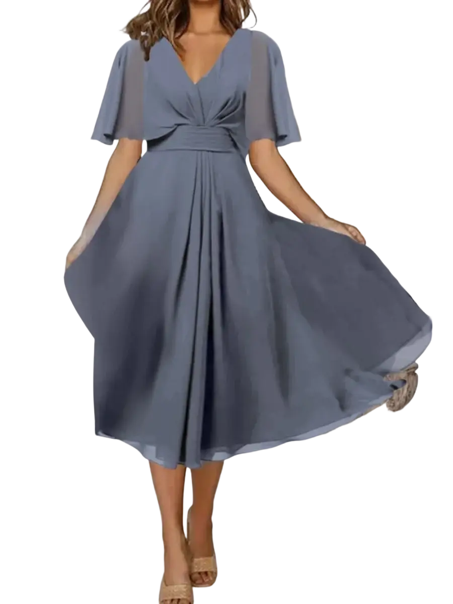 Plus size v-neck chiffon evening party dress in flowing dusty blue with flutter sleeves and cinched waist belt