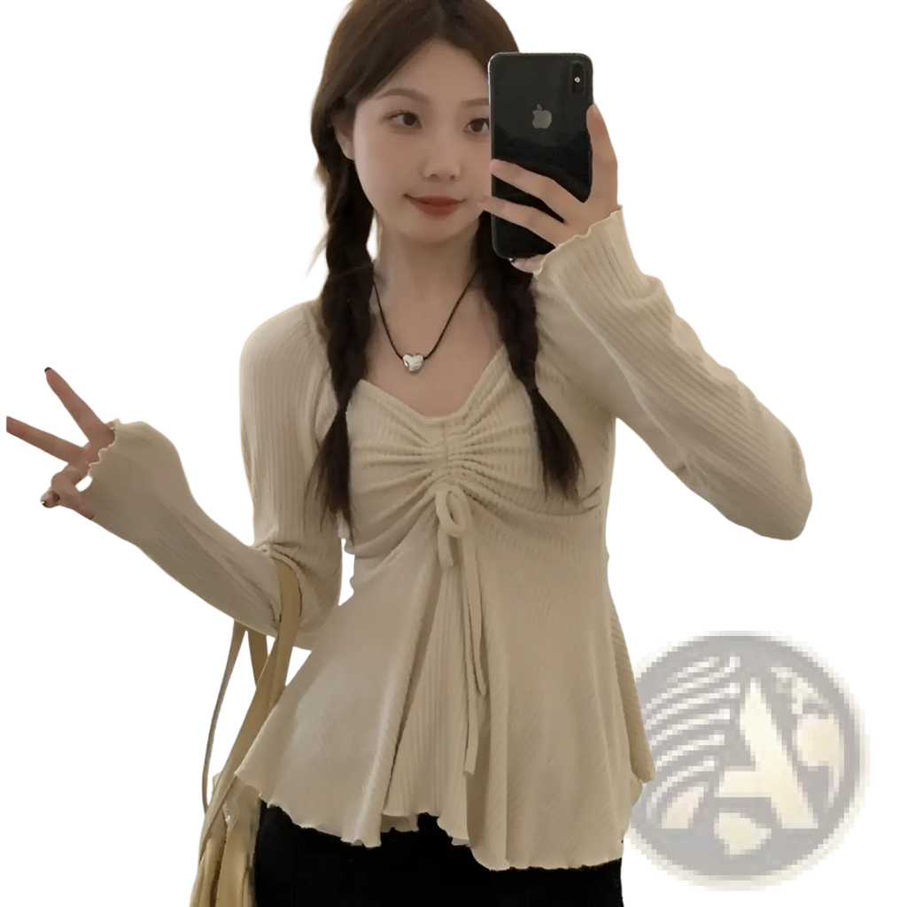 Beige ribbed knit cardigan with ruched front and peplum hem paired with plus size v neck short sleeve summer t shirt