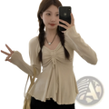 Beige ribbed knit cardigan with ruched front and peplum hem paired with plus size v neck short sleeve summer t shirt