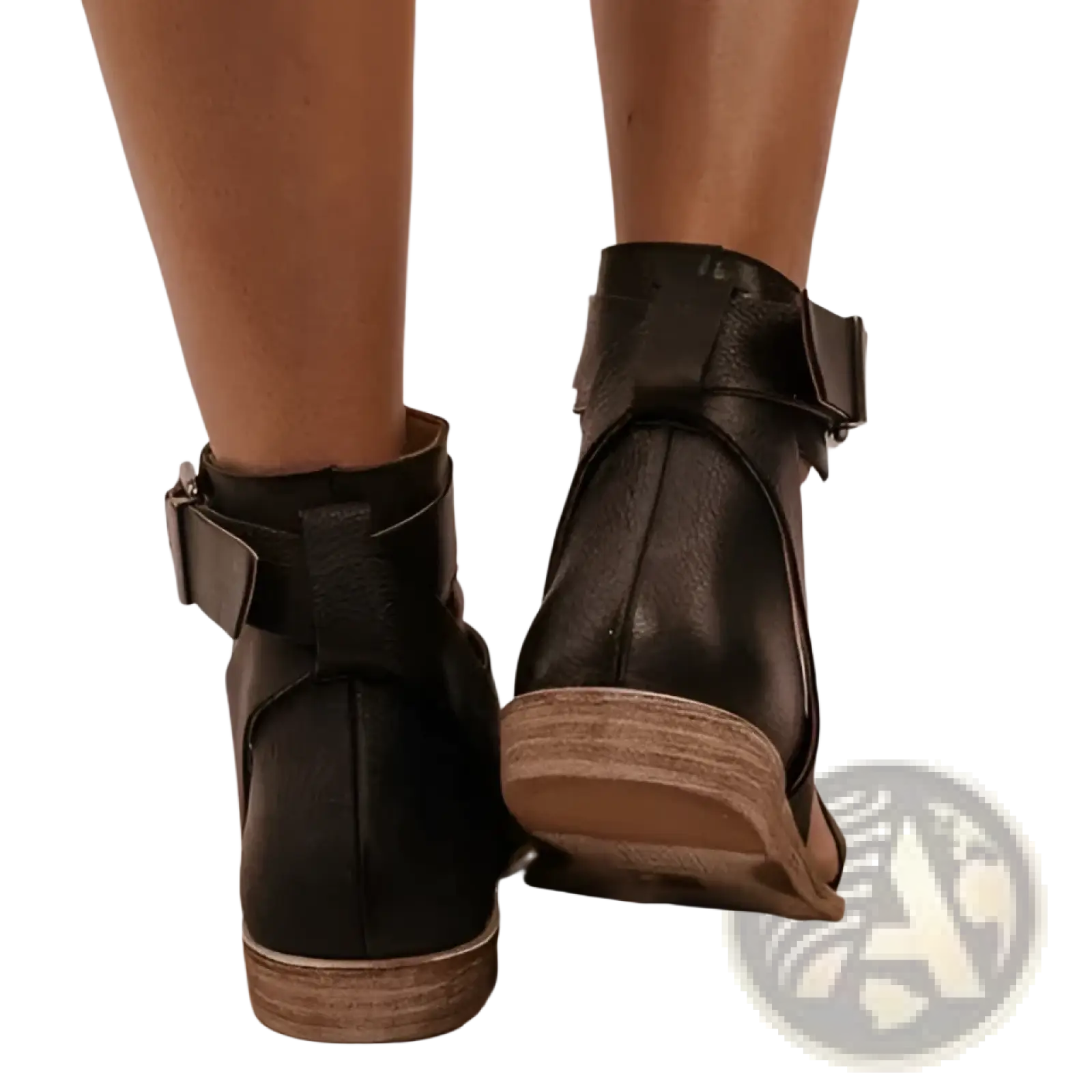 Black leather ankle boots with buckle strap and wooden soles styled as plus size women’s flat roman strappy sandals