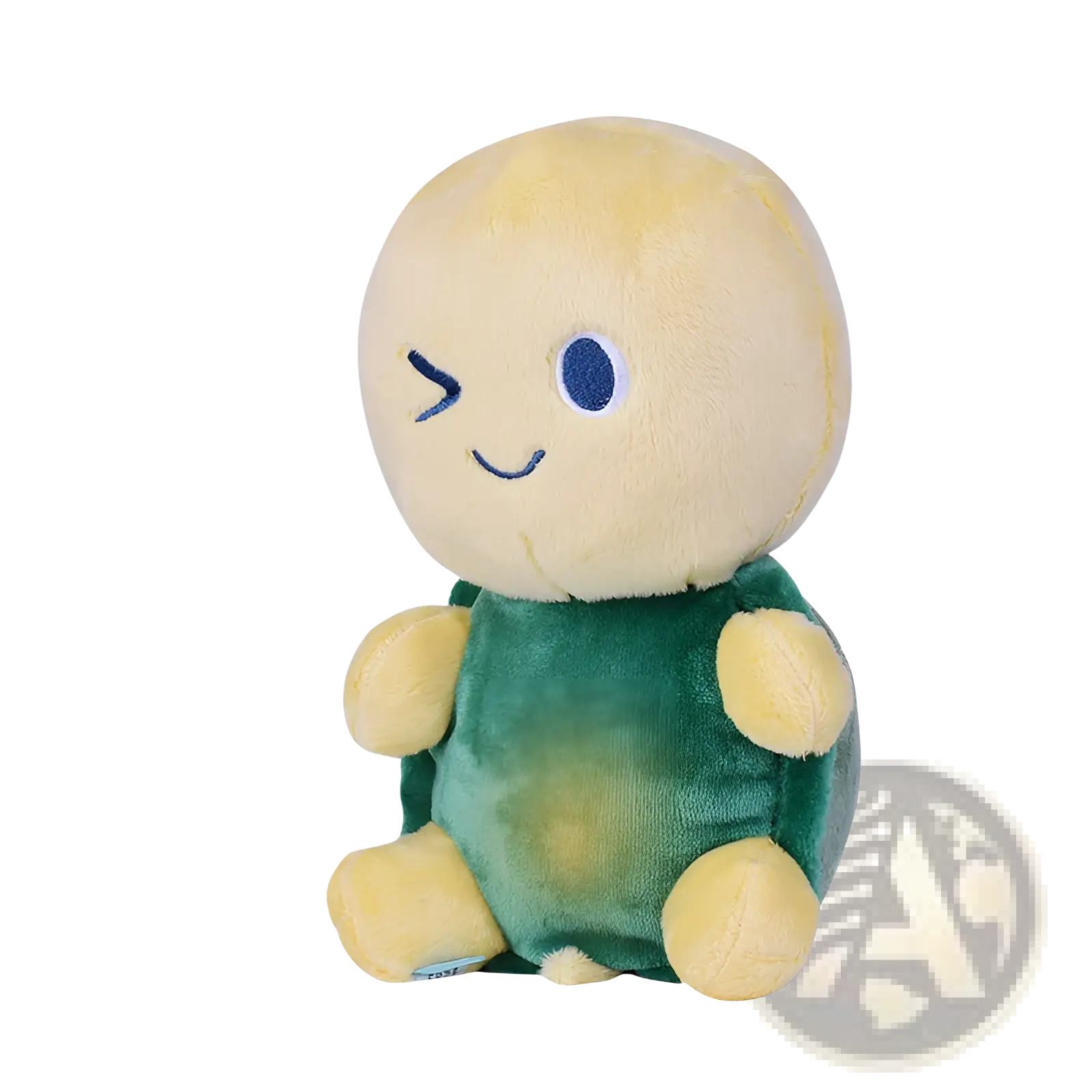 A soft cream-colored plush turtle comfort lamp with a green velvet shell and embroidered blue eyes for babies