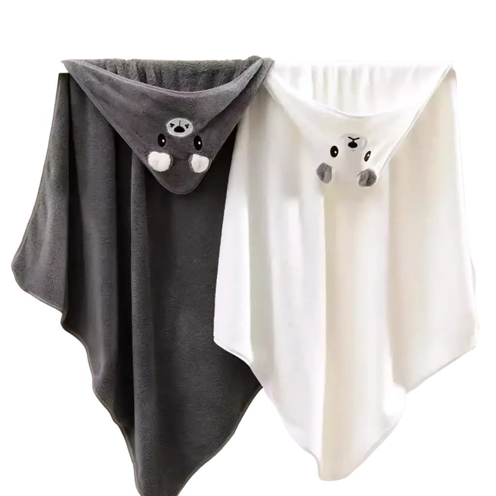 Plush animal hooded baby bath towels in gray and white with embroidered bear faces made of soft plush fabric hanging side by side