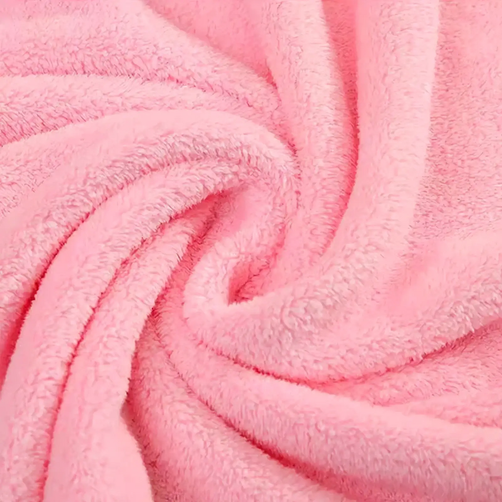 Soft pink plush animal hooded baby bath towel with fluffy textured surface made of absorbent material