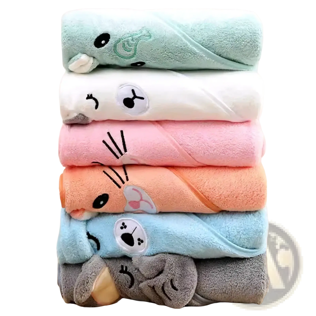 Stack of pastel plush animal hooded baby bath towels made of soft material for gentle infant drying