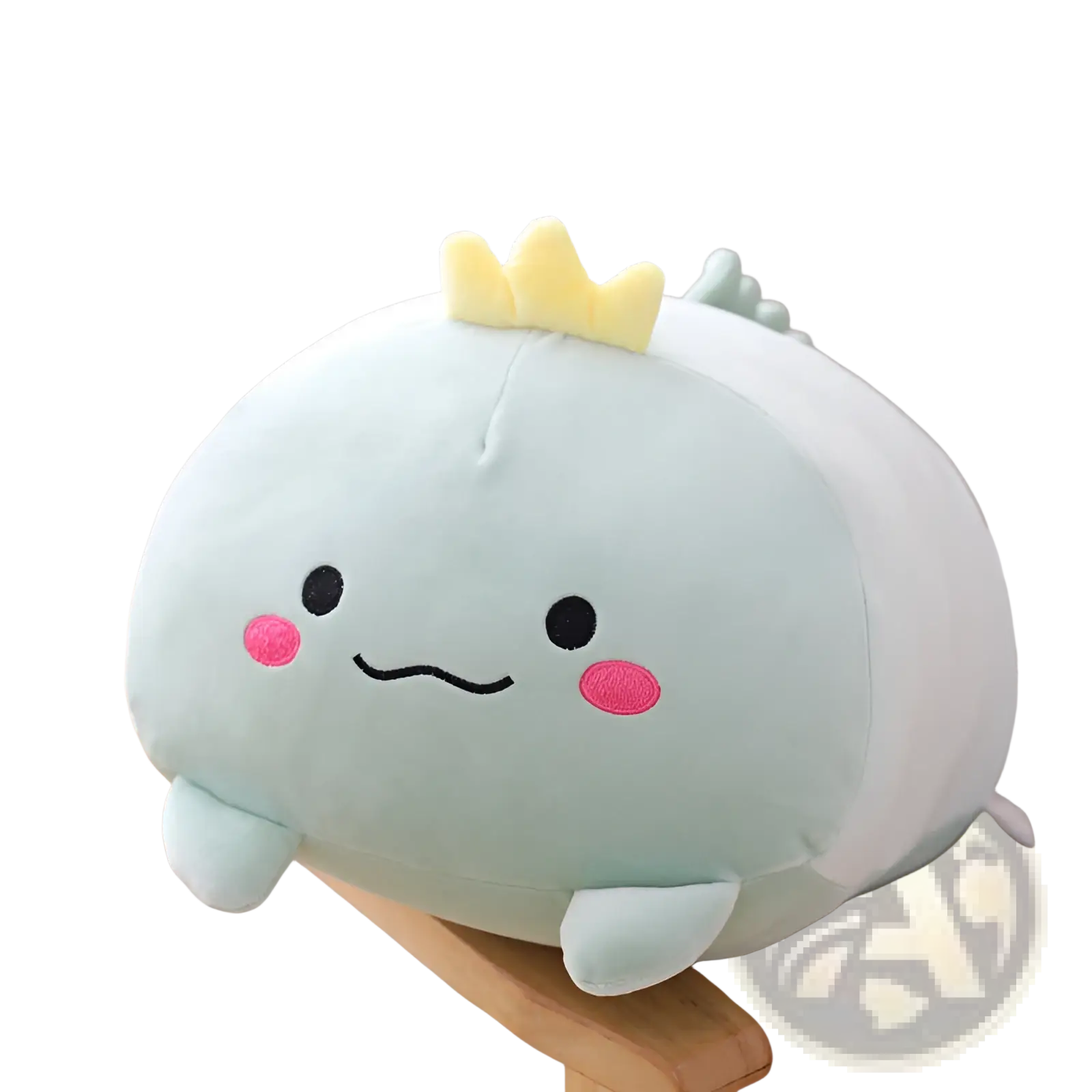 A soft light blue plush animal pillow shaped like a dinosaur with a yellow crown and pink cheeks for kids