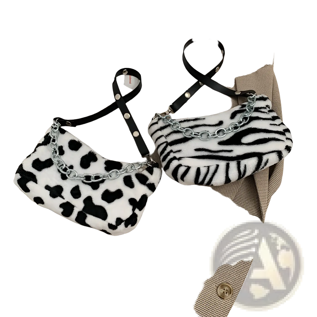 Two plush animal print baguette bags in black and white leopard and zebra patterns with silver chain straps