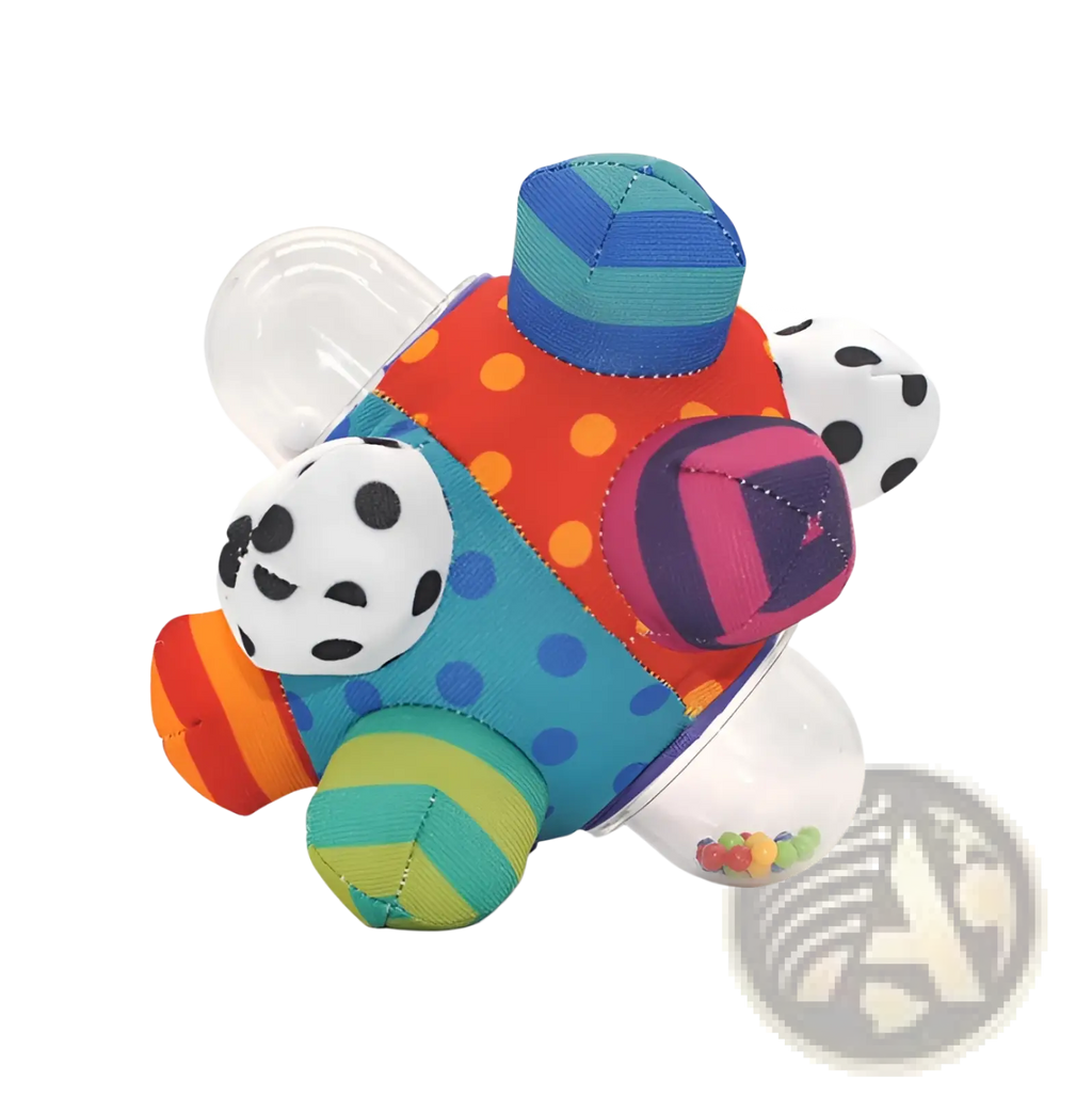 Plush baby rattle ball grasping toy shaped like a colorful patchwork caterpillar with transparent plastic segments and polka-dotted accents