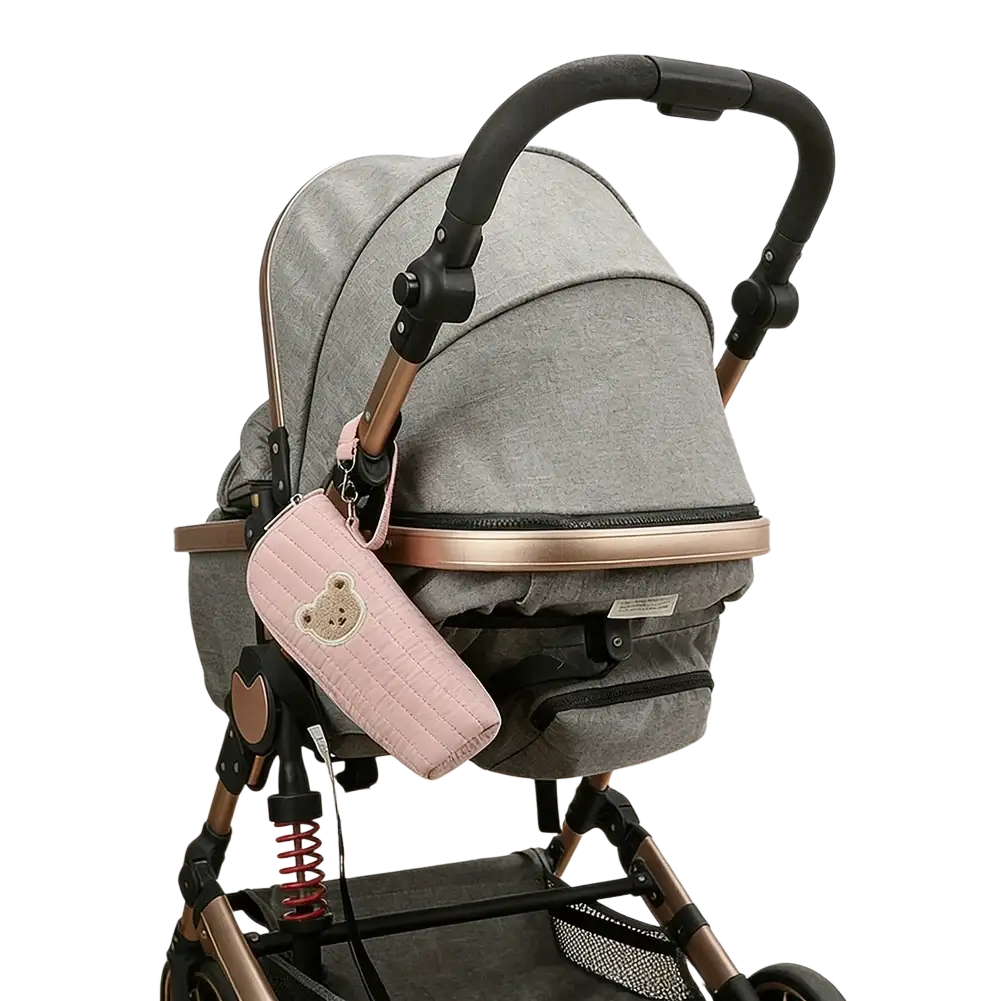 Pink quilted plush bear baby bottle warmer bag designed as a stroller accessory pouch for convenient use