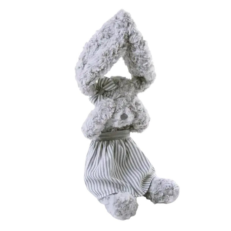 A soft gray plush bear stuffed animal wearing a striped dress and bow for sleeping and cuddling