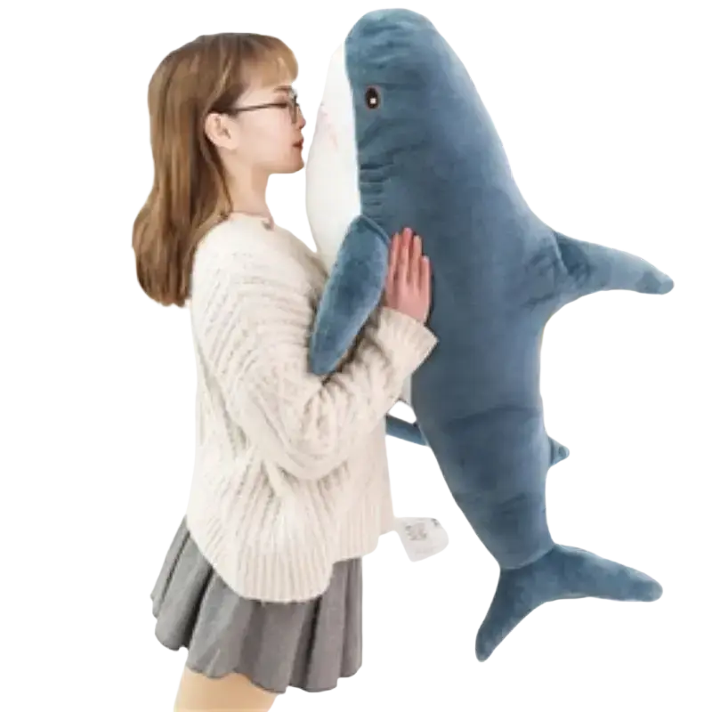 Plush blue shark stuffed animal pillow made of soft fabric designed for comfort and decoration