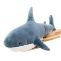 Plush blue shark stuffed animal pillow with white underbelly stitched details made of soft fabric material