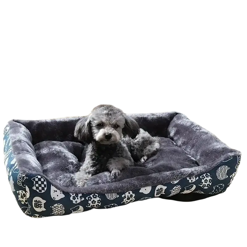 Cozy navy blue cat bed with plush gray fleece lining and white cat face patterns ideal for winter pet products