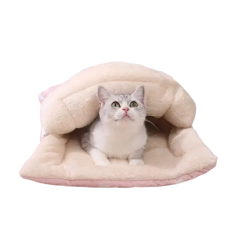 Cream-colored plush cat bed with cozy hood and pink trim designed as a pink bunny sleeping bag