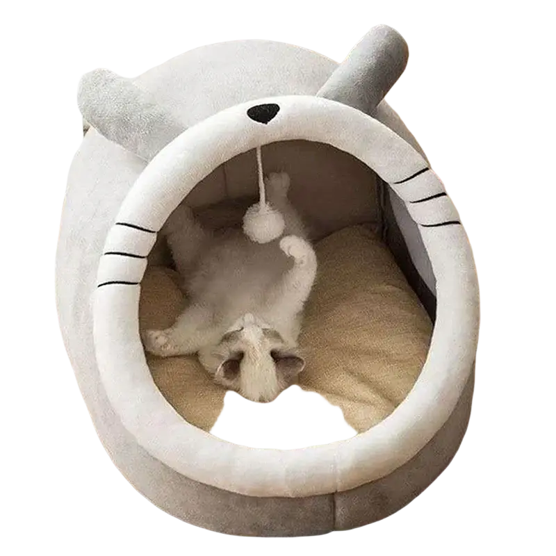 Soft gray plush cat cave bed with white circular entrance black embroidered whiskers cushioned washable sleeping mat