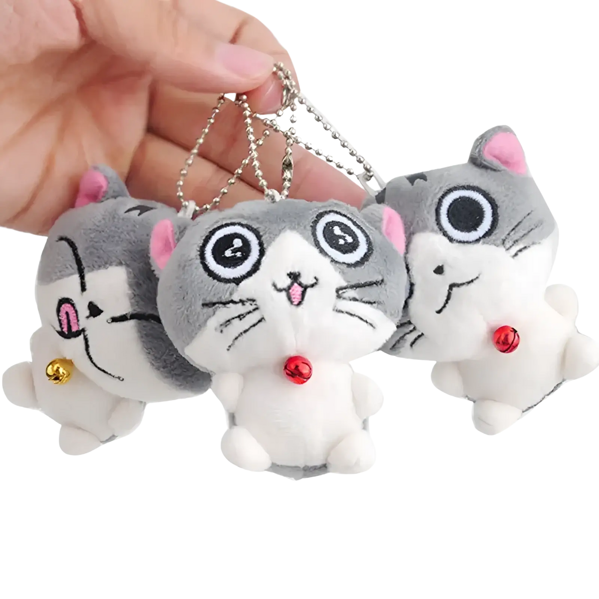 Plush cat keychain featuring cute gray and white kitten design with pink ears black eyes and small red and gold bells