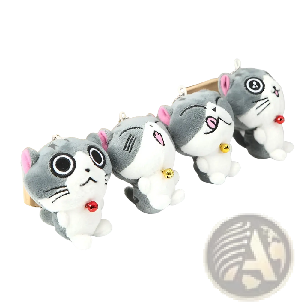 Plush cat keychain featuring cute gray and white kitten design with pink ears black eyes embroidered whiskers and tiny bells