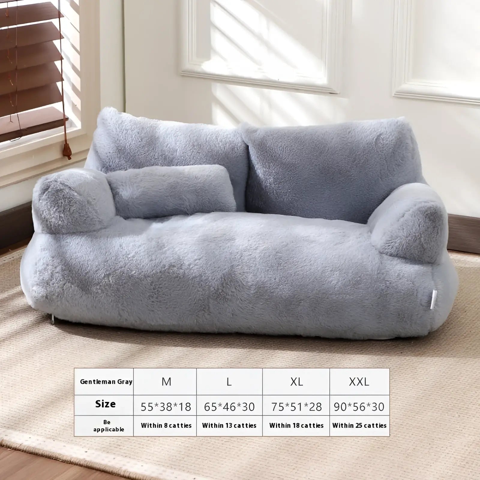 A plush light gray faux fur cat sofa bed with rounded armrests and a cozy cushioned design for warm winter lounging